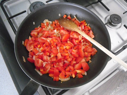 Add tomatoes and red bell pepper