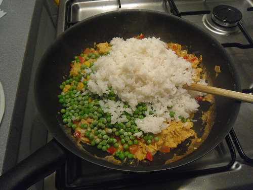 Adding the rice and other veggies