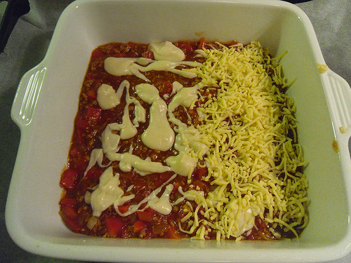 layer bechamel sauce and cheese